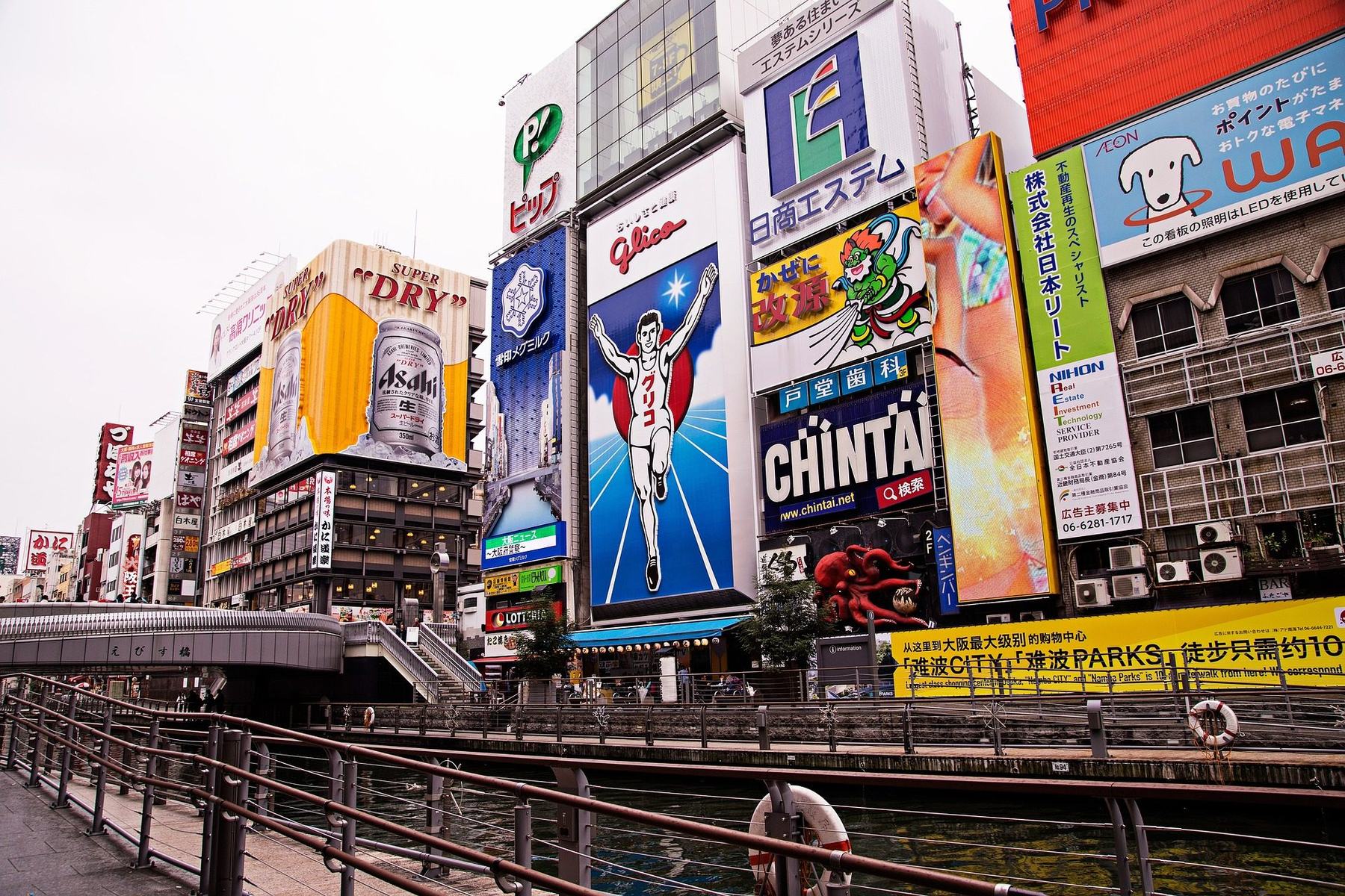 Dotonbori canal Osaka with Glico Running Man and neon billboards
